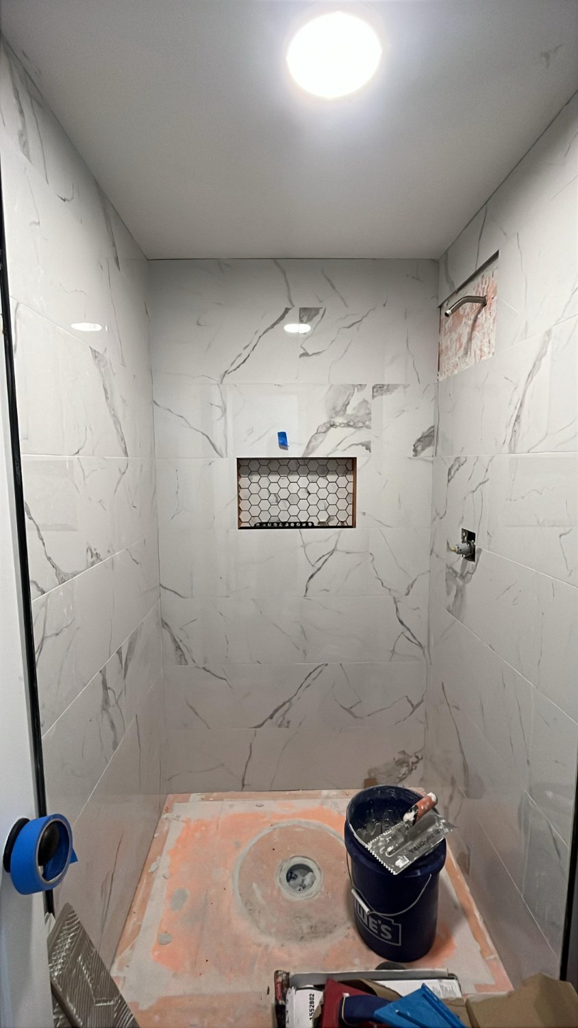 Marble tile walk-in shower